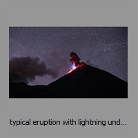 typical eruption with lightning under a starry sky